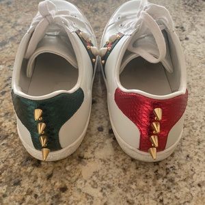 Gucci Ace studded Red/Green Pearl Tennis shoe.